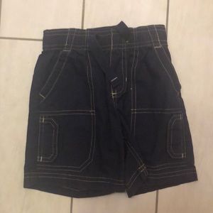 Navy Oshkosh shorts.